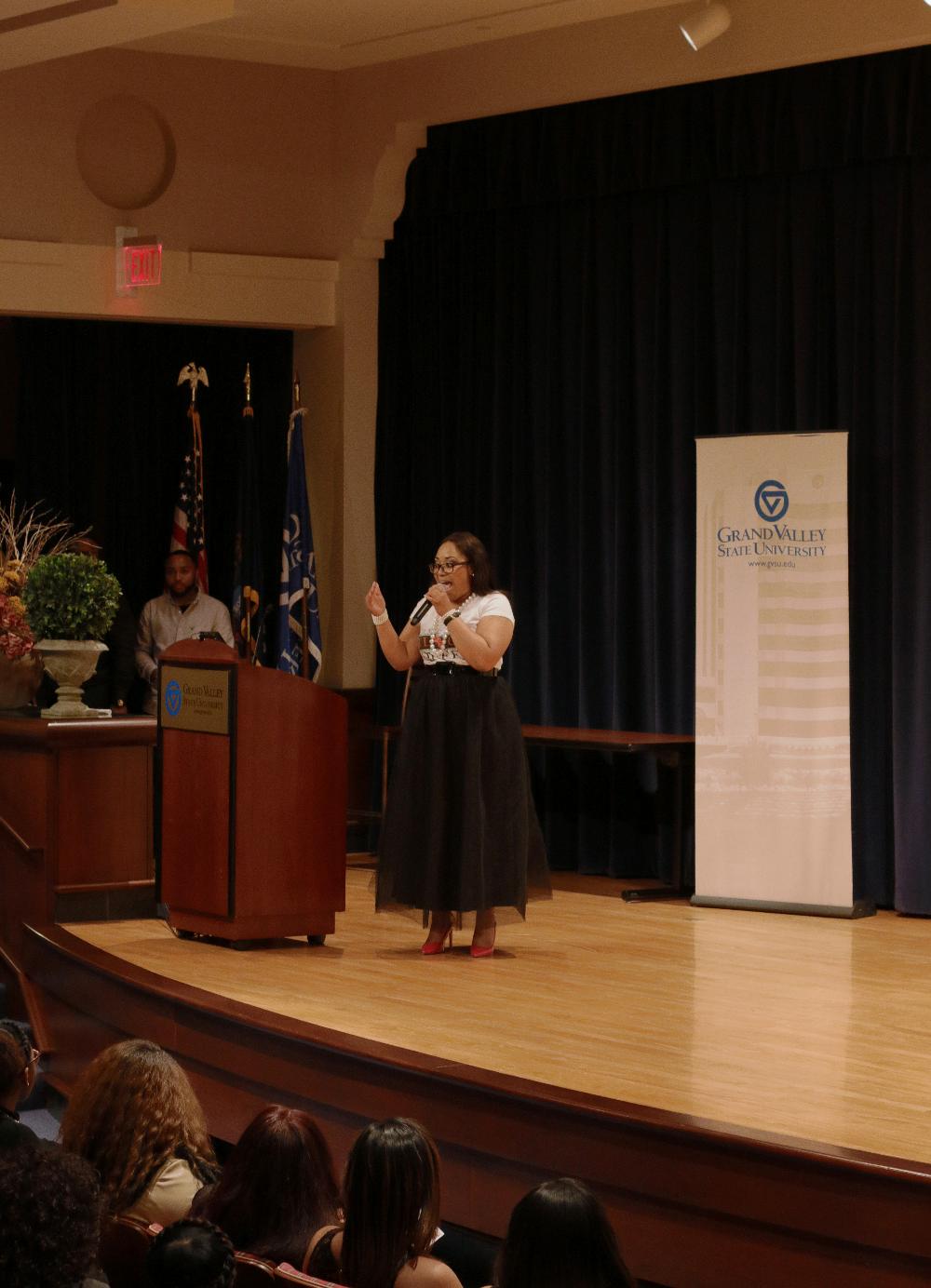 Te'Asia Martin at podium